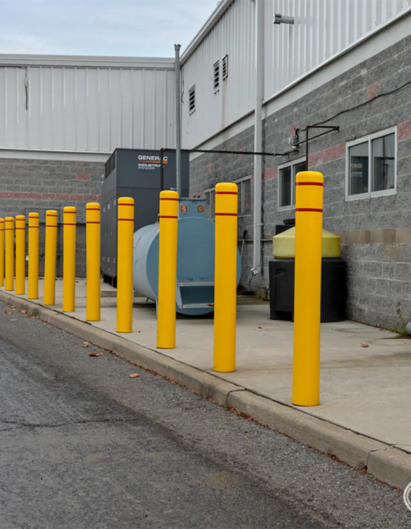 Steel bollards on a concrete pad