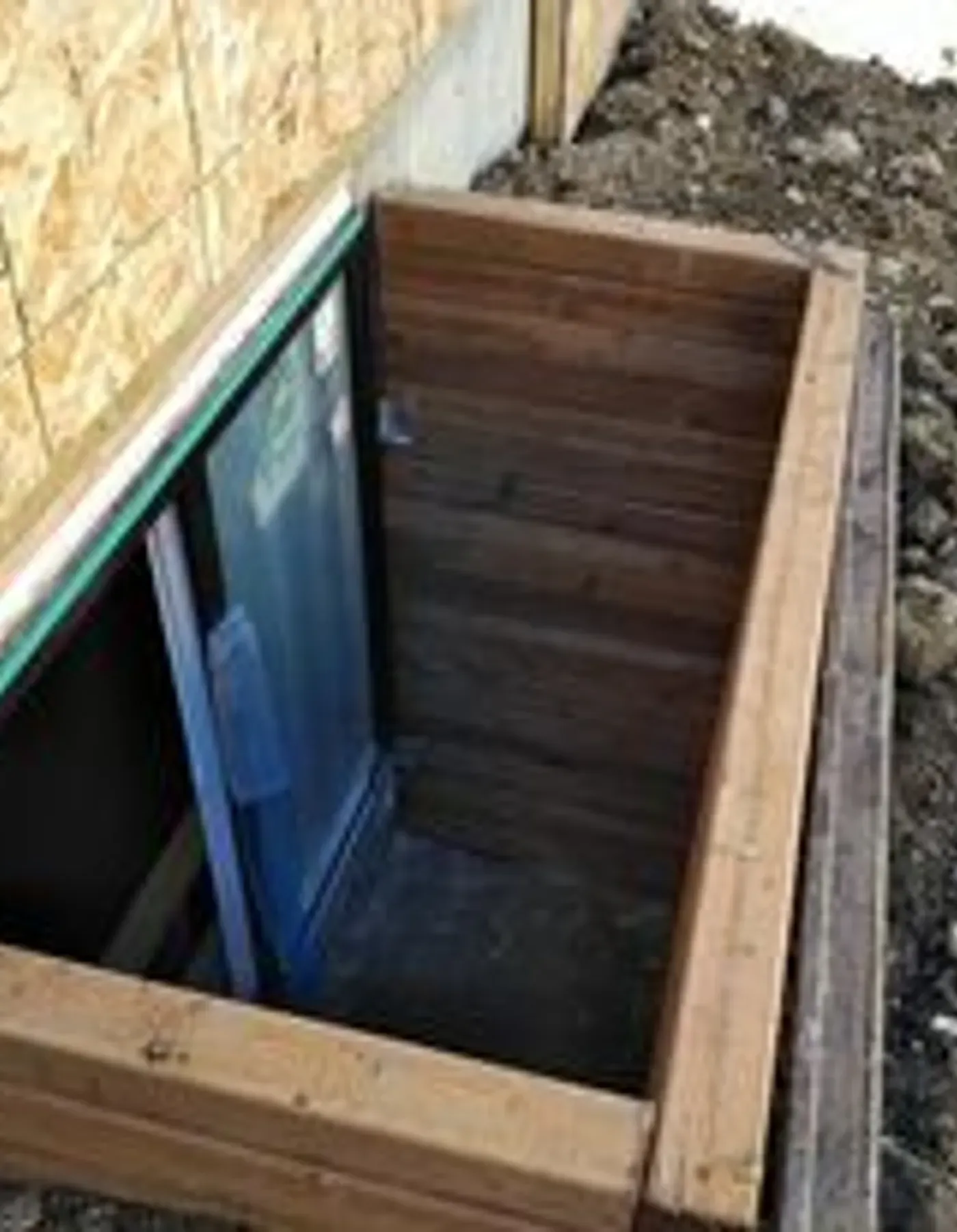 Pressure treated window well